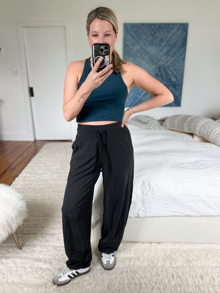 Lululemon Groove relaxed cinch pant worn as a lightweight summer workout pant, cinched at the ankle